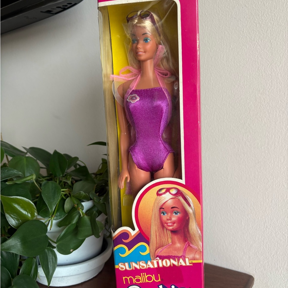 Mattel Sunsational Malibu Barbie in Purple Swimsuit